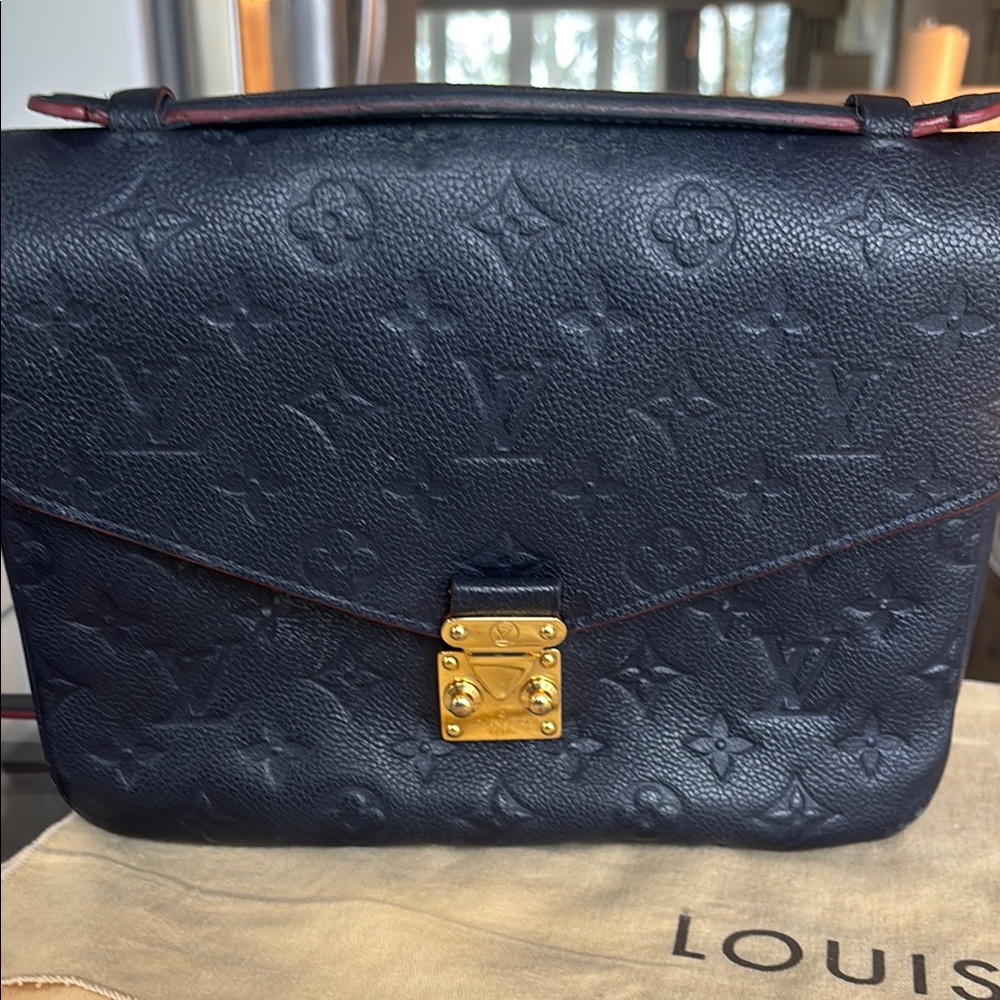 Louis Vuitton Black Crossbody Bag with Monogram Design